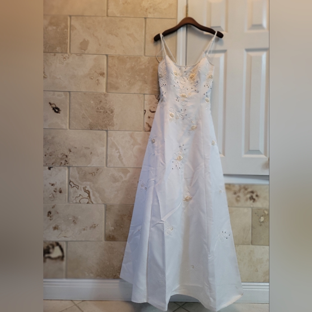 Elegant White Formal Dress by L'pogee Inc.